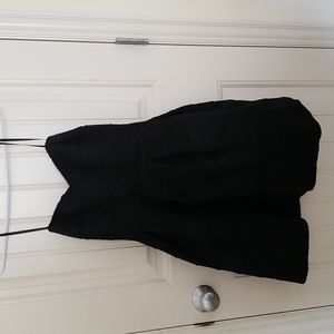 Strapless black elastic bandage dress with full skirt